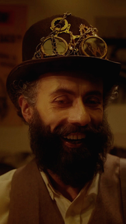 Foto de Eli, hombre con sombrero negro y barba